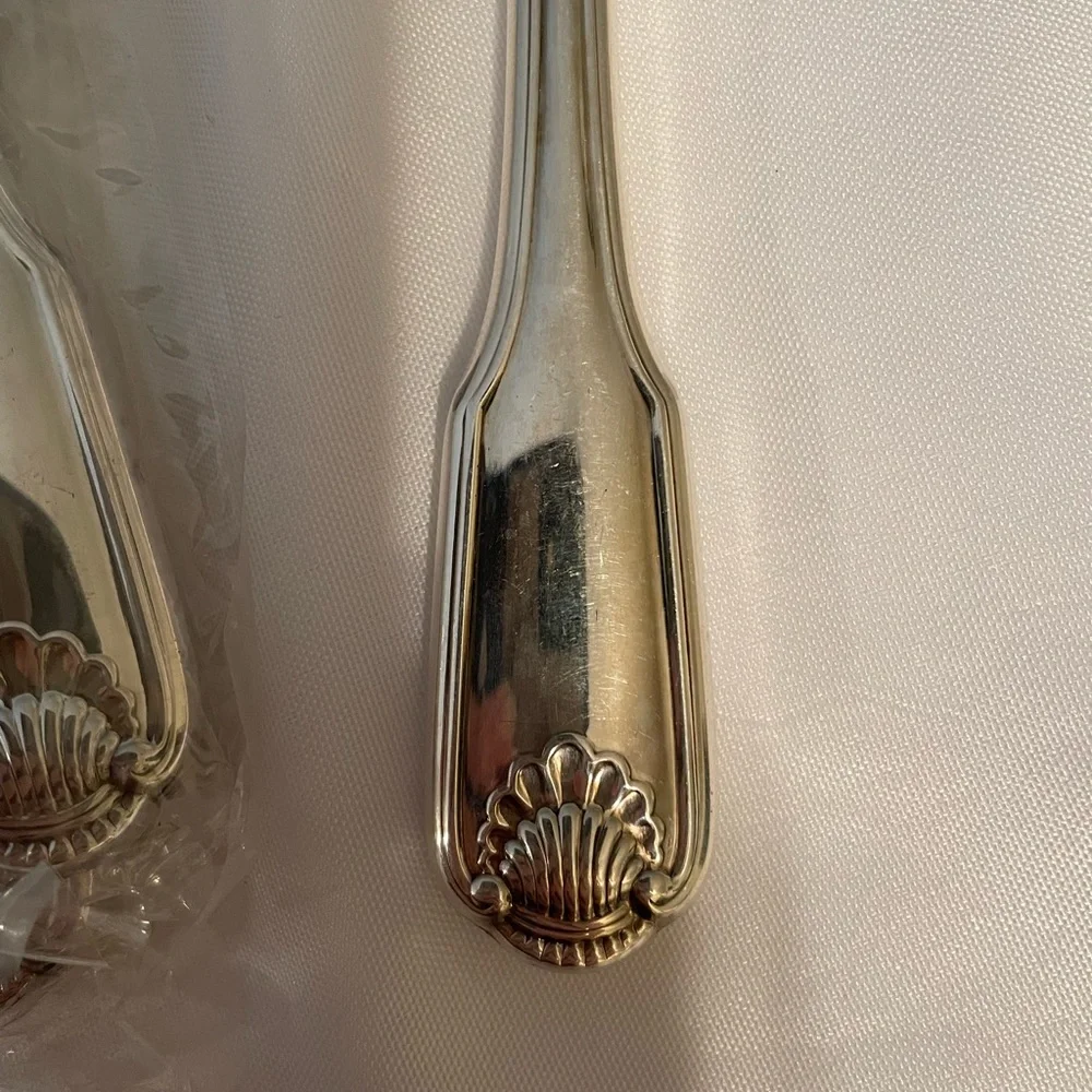 Dinner/Butter knife shell pattern in wrapper never used. 1 dozen (12) in pack
